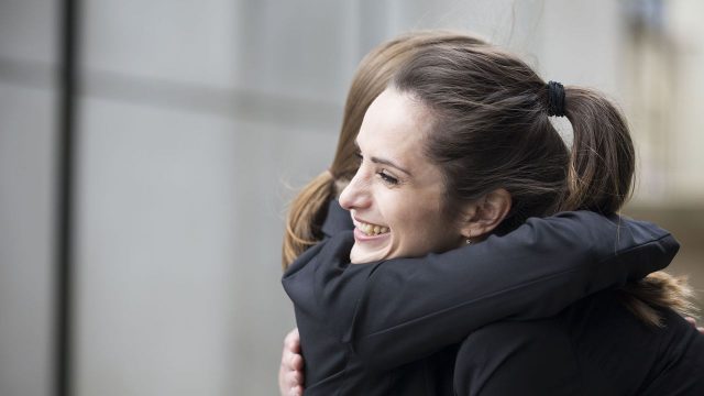two_women_hugging