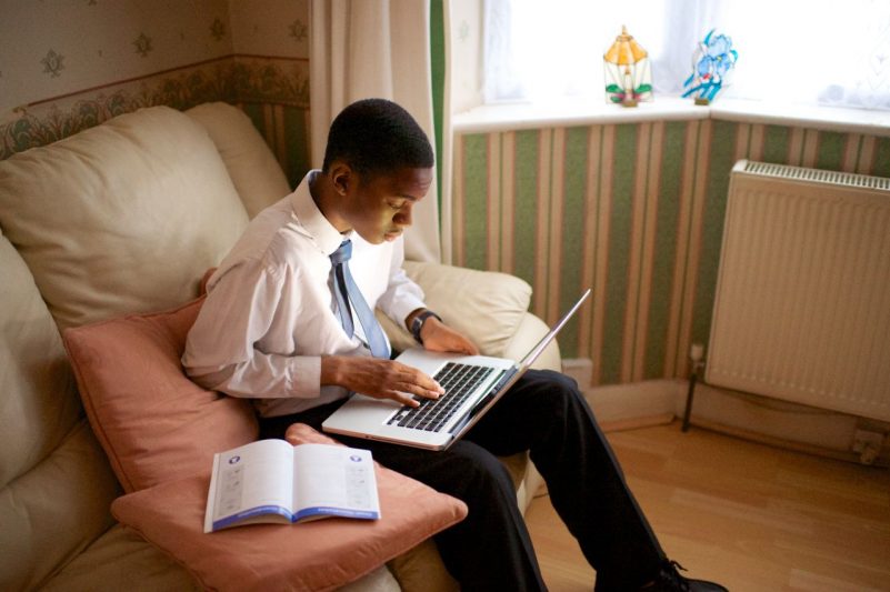 young_man_using_laptop